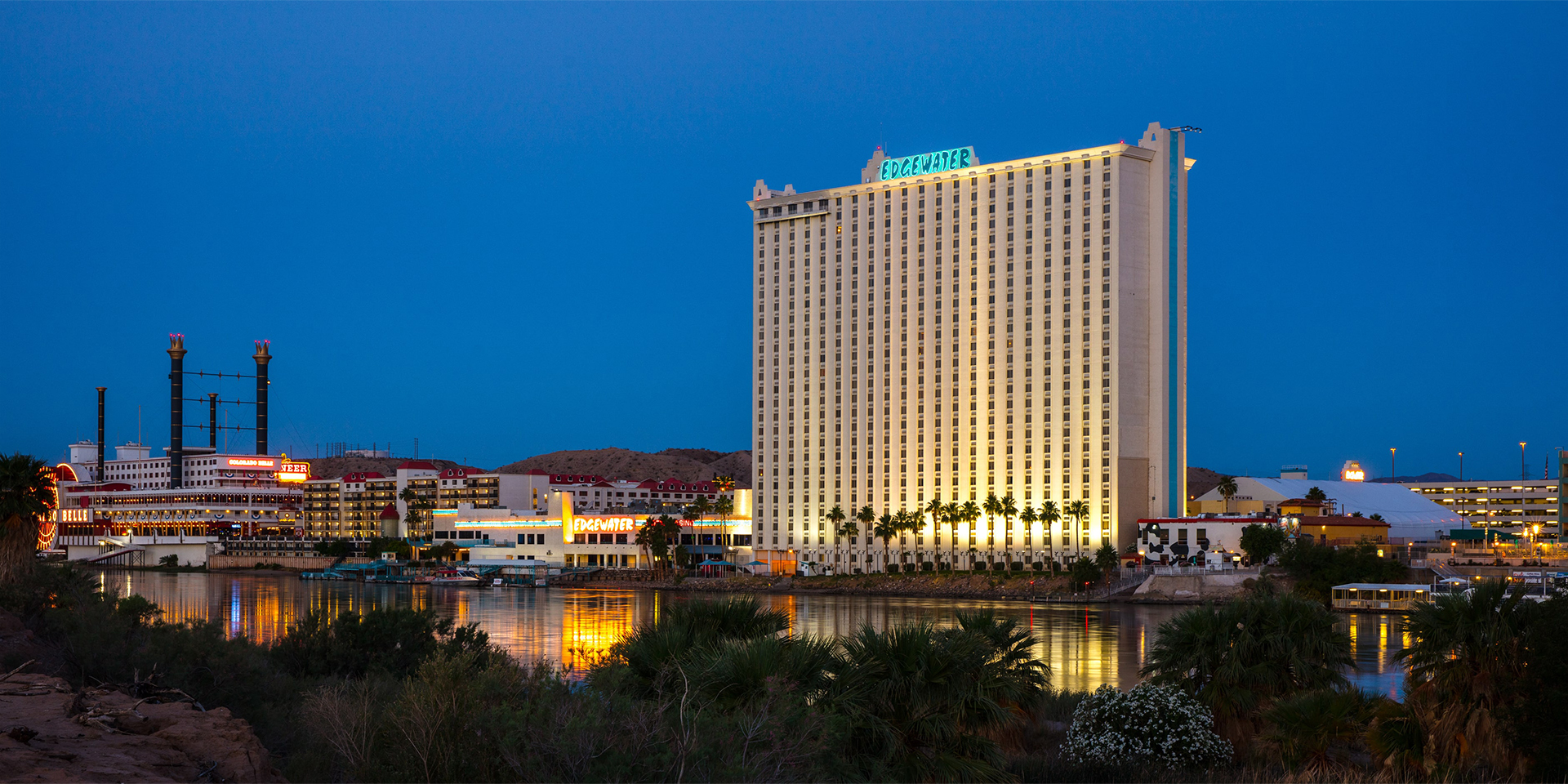Exterior of Edgewater Casino Hotel at dusk